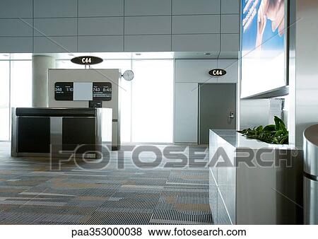 Check-in counter at boarding gate View Large Photo Image Stock Photo - Check-in counter at boarding gate. Fotosearch