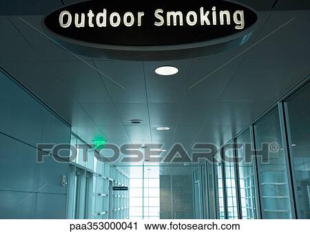 Outdoor smoking sign in airport View Large Photo Image Stock Image - Outdoor smoking sign in airport. Fotosearch