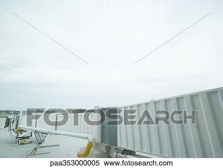 Passenger boarding bridge View Large Photo Image Stock Photography - Passenger boarding bridge. Fotosearch