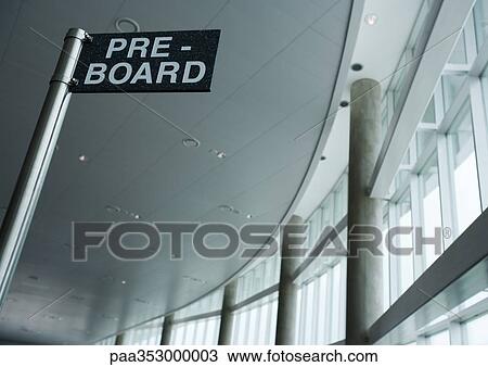 Pre-board sign in airport, low angle view View Large Photo Image Stock Image - Pre-board sign in airport, low angle view. Fotosearch