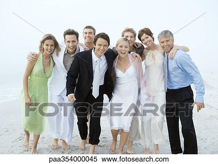 Beach wedding, group portrait View Large Photo Image Stock Photography - Beach wedding, group portrait. Fotosearch