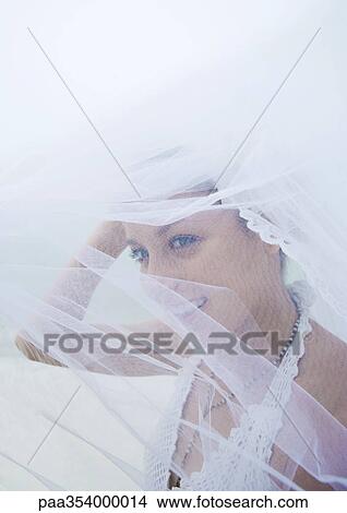 Bride, veil flying in wind View Large Photo Image Picture - Bride, veil flying in wind. Fotosearch