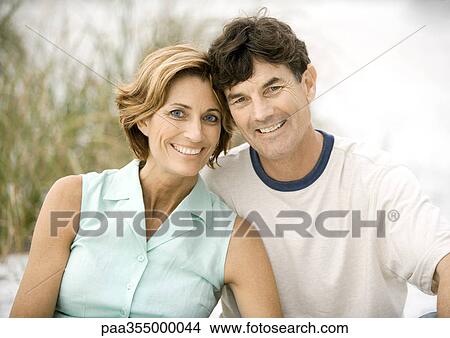 Picture - Mature couple smiling, portrait. Fotosearch