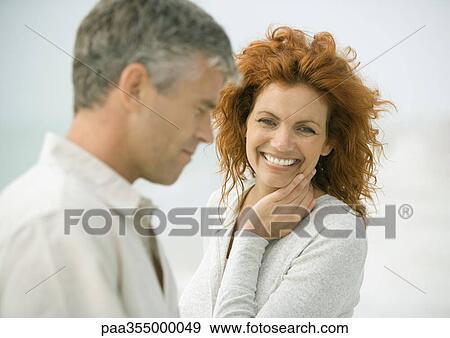 Mature couple, woman smiling View Large Photo Image Stock Photo - Mature couple, woman smiling. Fotosearch