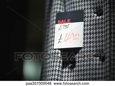 Price tag on coat View Large Photo Image Stock Photo - Price tag on coat. Fotosearch