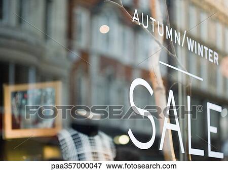 Sale sign in shop window View Large Photo Image Stock Photo - Sale sign in shop window. Fotosearch