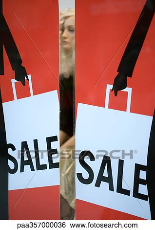 Sale sign in shop window View Large Photo Image Stock Photograph - Sale sign in shop window. Fotosearch