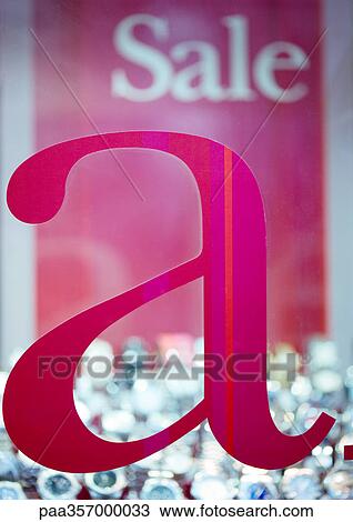 Stock Image - Sale sign in watch store. Fotosearch