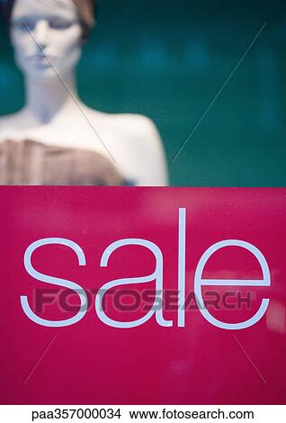 Picture - Sale sign on shop window. Fotosearch