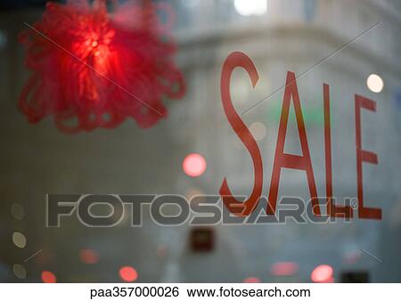 Sale sign on shop window View Large Photo Image Stock Photograph - Sale sign on shop window. Fotosearch