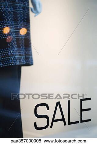 Stock Photo - Shop window with sale sign. Fotosearch