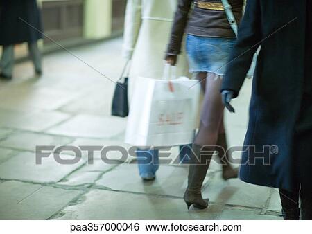 Shoppers walking in street View Large Photo Image Stock Photograph - Shoppers walking in street. Fotosearch