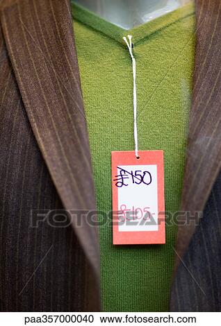 Sweater with reduced price on tag View Large Photo Image Stock Image - Sweater with reduced price on tag. Fotosearch
