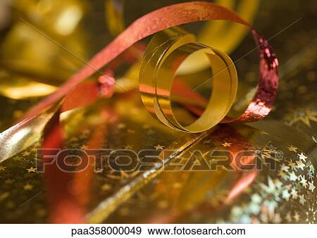 Christmas gift, extreme close-up View Large Photo Image Stock Photo - Christmas gift, extreme close-up. Fotosearch