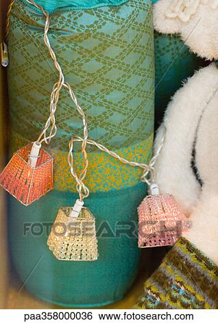 Stock Photograph - Strand of lanterns. Fotosearch