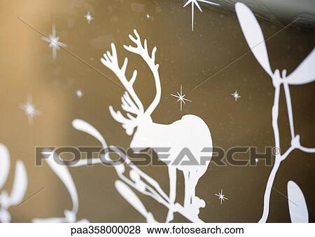 White reindeer silhouette on gold background View Large Photo Image Stock Photo - White reindeer silhouette on gold background. Fotosearch