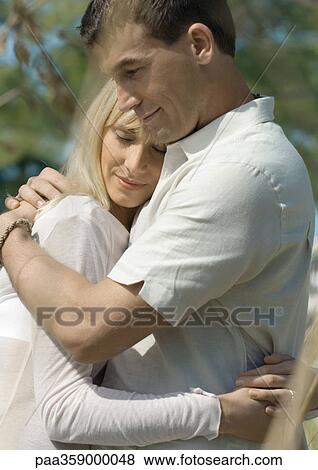 Stock Photo - Couple embracing. Fotosearch