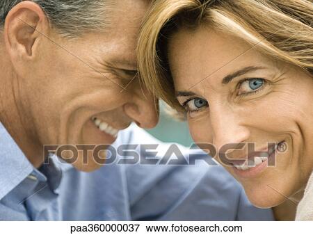 Stock Photo - Mature couple smiling. Fotosearch