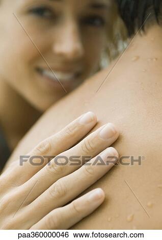 Woman's hand on man's shoulder, close-up View Large Photo Image Stock Photograph - Woman's hand on man's shoulder, close-up. Fotosearch