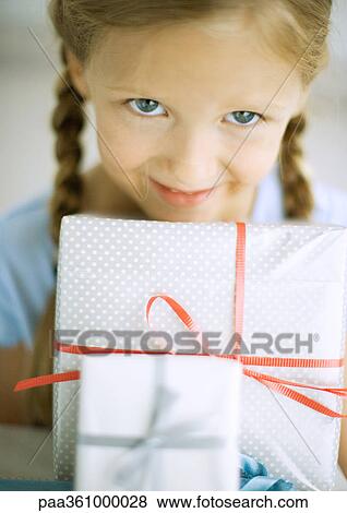 Girl with presents View Large Photo Image Stock Photo - Girl with presents. Fotosearch