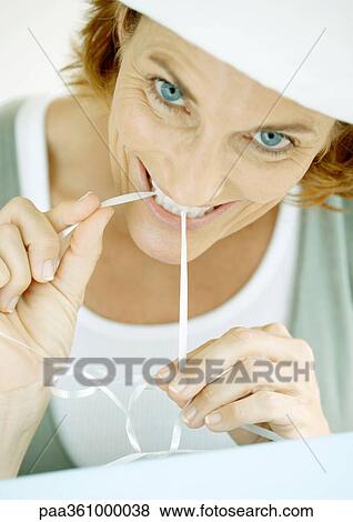 Woman wrapping present View Large Photo Image Stock Photo - Woman wrapping present. Fotosearch