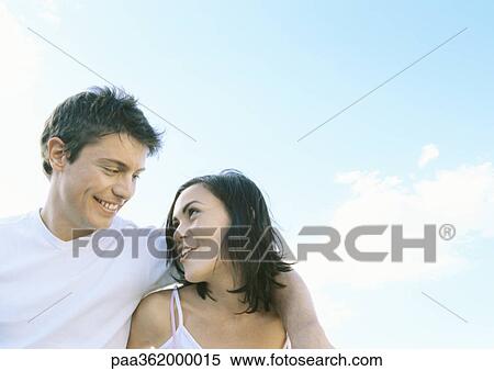 Stock Photography - Young couple outdoors. Fotosearch