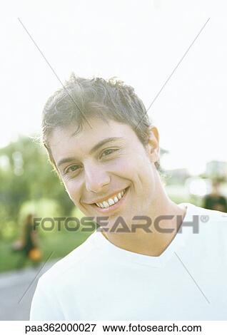 Stock Photo - Young man, portrait. Fotosearch
