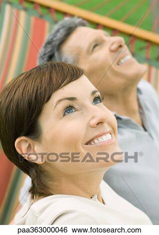 Mature couple in hammock View Large Photo Image Stock Photograph - Mature couple in hammock. Fotosearch