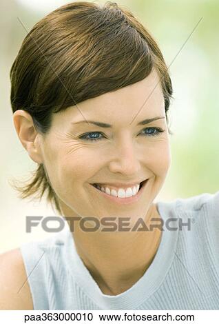 Woman smiling, portrait View Large Photo Image Stock Image - Woman smiling, portrait. Fotosearch