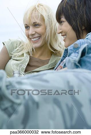 Two young adult female friends View Large Photo Image Stock Image - Two young adult female friends. Fotosearch