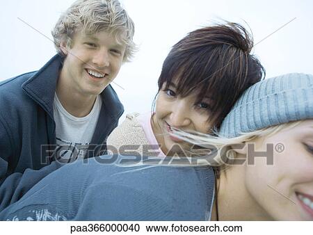 Stock Image - Young adult friends. Fotosearch