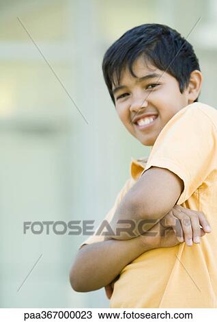 Preteen boy folding arms View Large Photo Image Stock Image - Preteen boy folding arms. Fotosearch