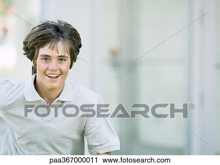 Preteen boy running View Large Photo Image Stock Image - Preteen boy running. Fotosearch