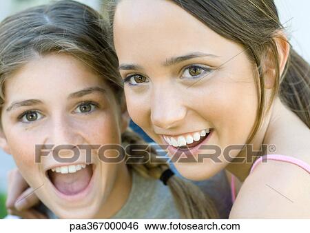 Stock Photograph - Preteen friends, portrait. Fotosearch