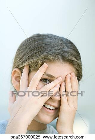 Preteen girl covering face View Large Photo Image Stock Photography - Preteen girl covering face. Fotosearch