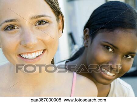 Stock Photo - Teen girls, portrait. Fotosearch