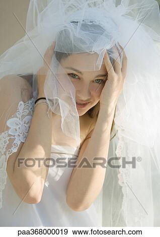 Preteen girl dressed up as bride View Large Photo Image Stock Photo - Preteen girl dressed up as bride. Fotosearch
