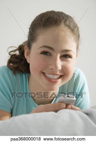 Preteen girl smiling View Large Photo Image Stock Photo - Preteen girl smiling. Fotosearch