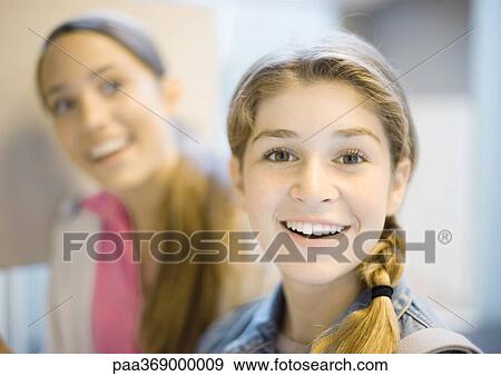 Stock Photo - Teenage girls smiling. Fotosearch