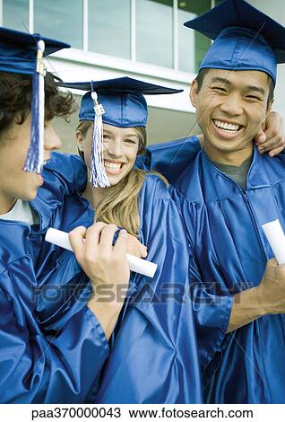 Graduates with diplomas, laughing View Large Photo Image Stock Image - Graduates with diplomas, laughing. Fotosearch