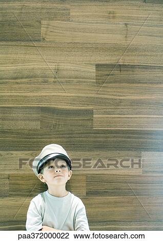 Boy wearing captain's hat View Large Photo Image Stock Image - Boy wearing captain's hat. Fotosearch