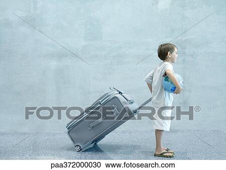 Boy with suitcase and globe View Large Photo Image Stock Image - Boy with suitcase and globe. Fotosearch