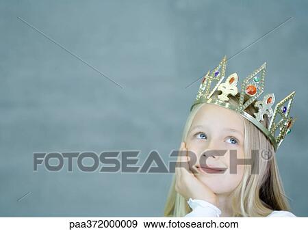 Stock Photo - Girl wearing crown. Fotosearch