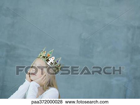 Stock Photo - Girl wearing crown. Fotosearch