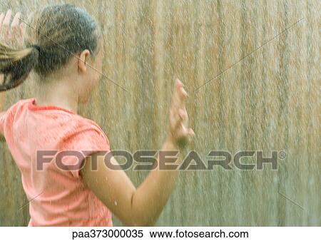 Girl getting wet View Large Photo Image Stock Photography - Girl getting wet. Fotosearch