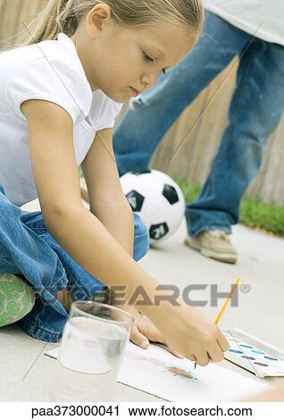 Girl painting outdoors View Large Photo Image Stock Image - Girl painting outdoors. Fotosearch