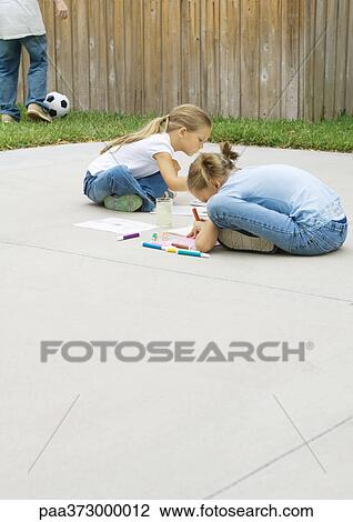 Kids sitting on driveway, drawing View Large Photo Image Stock Image - Kids sitting on driveway, drawing. Fotosearch