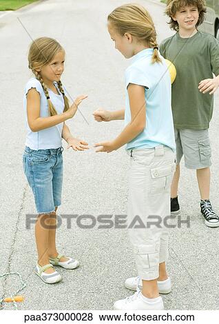 Suburban children playing in street View Large Photo Image Stock Photo - Suburban children playing in street. Fotosearch