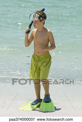 Boy wearing scuba gear on beach View Large Photo Image Stock Photo - Boy wearing scuba gear on beach. Fotosearch