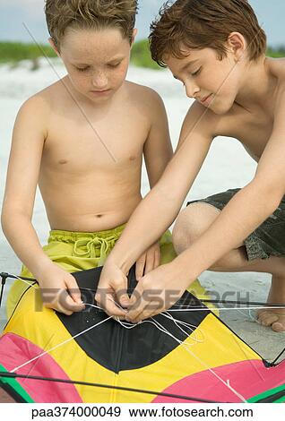 Stock Photo - Boys with kite. Fotosearch